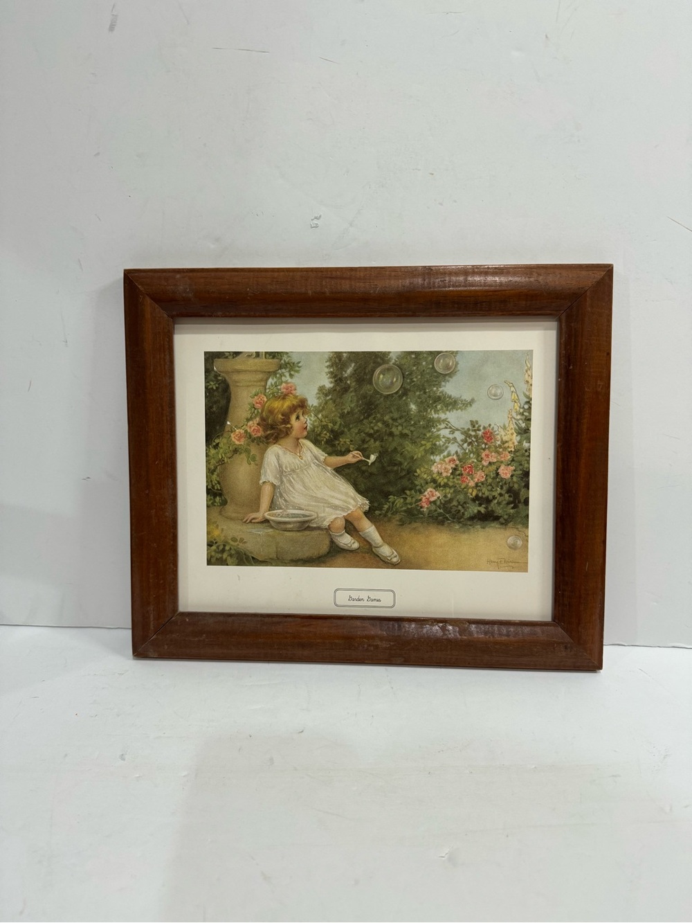 Vintage "Garden Games" Girl Blowing